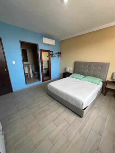 Ein Bett oder Betten in einem Zimmer der Unterkunft Puul Suites