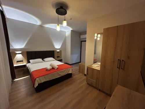 Ένα ή περισσότερα κρεβάτια σε δωμάτιο στο Mayavera Otel