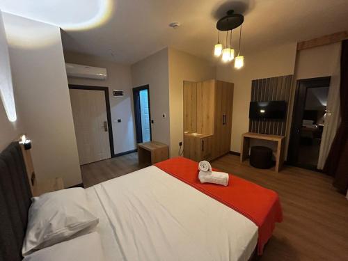 Ένα ή περισσότερα κρεβάτια σε δωμάτιο στο Mayavera Otel