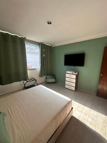 Ein Bett oder Betten in einem Zimmer der Unterkunft Puul Suites