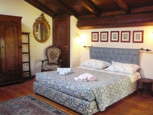 A bed or beds in a room at Agriturismo Ca' di Mazza