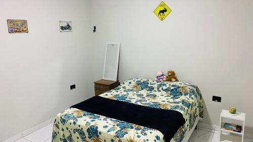 Postel nebo postele na pokoji v ubytování Casa Inteira Aconchegante com Garagem