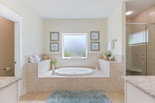 Koupelna v ubytování Arborgate Sunkissed Seahorse At 13987 Hanging Branch Way By Pkrm