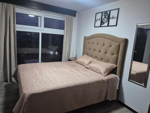 Cama o camas de una habitación en Donde Mickey cerca Antigua Guatemala