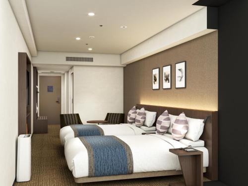 Katil atau katil-katil dalam bilik di Hotel Mystays Premier Hamamatsucho