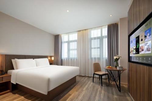 Katil atau katil-katil dalam bilik di Atour X Hotel Hangzhou Binjiang Torch Avenue