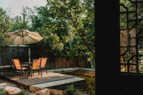 Un jardín fuera de Ganzhou Banjiangxia Homestay