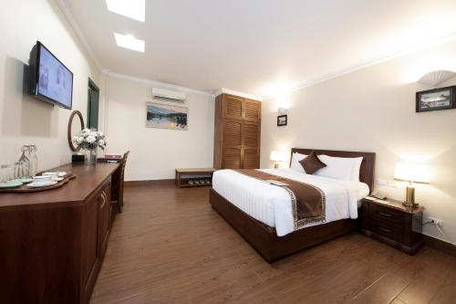 Postel nebo postele na pokoji v ubytování Phuong Nam Resort