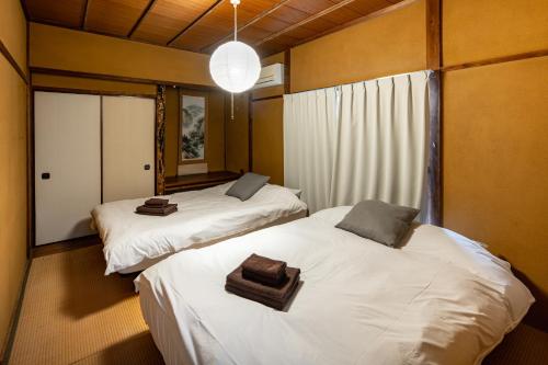 Ένα ή περισσότερα κρεβάτια σε δωμάτιο στο 中板橋