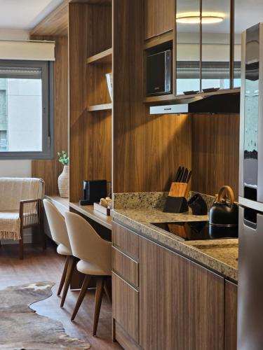 Dapur atau dapur kecil di Tempo The Arch - Bela Vista, Auxiliadora, Apartamentos em Porto Alegre