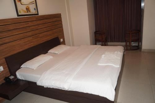 Cama o camas de una habitación en HoTEL CENTER POINT