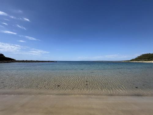 a view of the ocean from the beach at Australian Beach and Sea Haven in Broulee