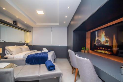 Ruang duduk di Tempo The Arch - Bela Vista, Auxiliadora, Apartamentos em Porto Alegre