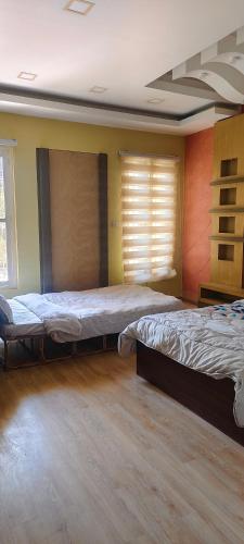 Letto o letti in una camera di Heritage View Homestay