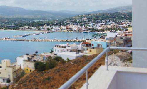 a view of a city and a body of water at Porto Kaza in Sitia