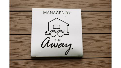 a sign that saysamed by my way with a truck at Rural Delight by Tiny Away in Ohaupo