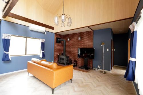 TV a/nebo společenská místnost v ubytování Fun Dog Villa Nasu -ファンドッグ ヴィラ那須 -