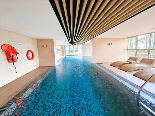 Galeriebild der Unterkunft Cozy 1BR Gold Coast PIK with Pool, Gym, Netflix by 2ndHome in Jakarta