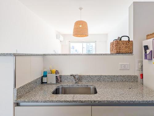 Kuchyň nebo kuchyňský kout v ubytování Frente al sanatorio de la mujer - totalmente equipado y con balcon