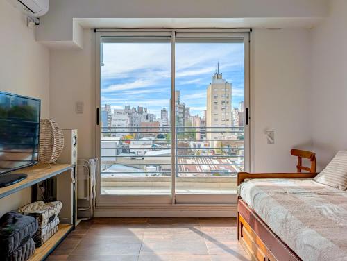 Postel nebo postele na pokoji v ubytování Frente al sanatorio de la mujer - totalmente equipado y con balcon