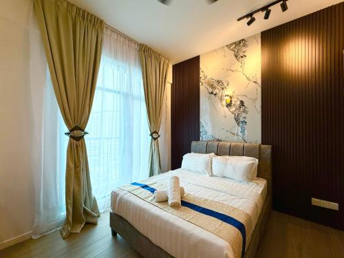 Ένα ή περισσότερα κρεβάτια σε δωμάτιο στο Bay Premier Suites by SSVC