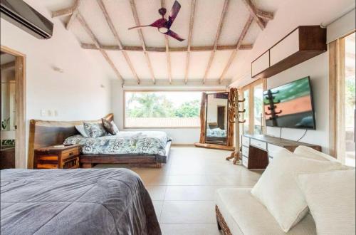 Ένα ή περισσότερα κρεβάτια σε δωμάτιο στο Finca luxury Villavicencio Restrepo