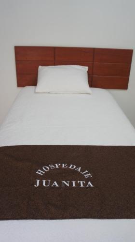 Postel nebo postele na pokoji v ubytování Hospedaje Juanita
