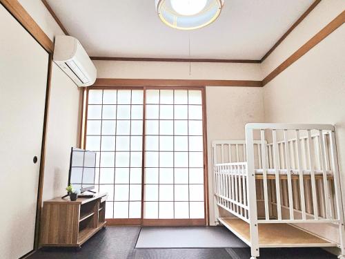 伊の屋 駅徒歩2分難波商圏空港直通住宅区戸建最大16人