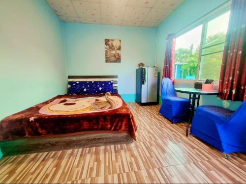Katil atau katil-katil dalam bilik di In Love Resort