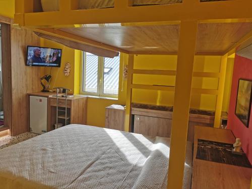 Postel nebo postele na pokoji v ubytování Sailorsroom