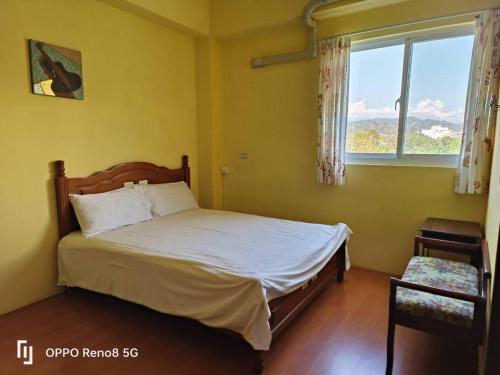 Una cama o camas en una habitación de 茶樂二重奏