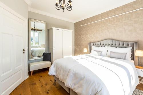 Postel nebo postele na pokoji v ubytování Hotel Villa Wahnfried Thiessow