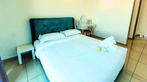 Ένα ή περισσότερα κρεβάτια σε δωμάτιο στο Galaxy Luxury Homestay