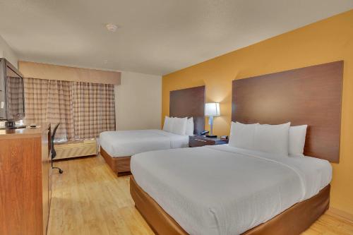 Cama o camas de una habitación en Quality Inn near Six Flags Discovery Kingdom-Napa Valley