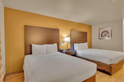 Cama o camas de una habitación en Quality Inn near Six Flags Discovery Kingdom-Napa Valley
