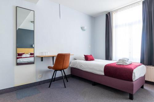 Postel nebo postele na pokoji v ubytování Hotel Montovani