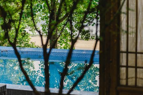 La alberca dentro o cerca de Ganzhou Banjiangxia Homestay