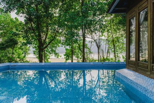 La alberca dentro o cerca de Ganzhou Banjiangxia Homestay