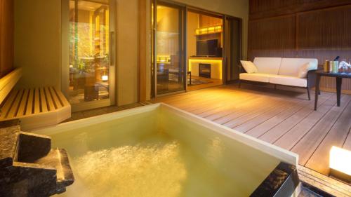 Postel nebo postele na pokoji v ubytování Tofuya Resort&Spa-Izu