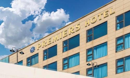 a beige building with the words preparedres hotel on it at Wolmido Premiers Hotel in Incheon