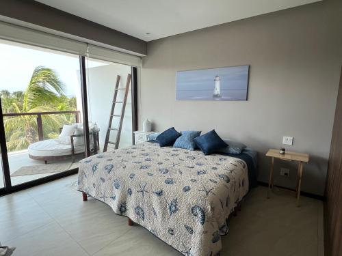 a bedroom with a bed and a ladder and a lighthouse at Acapulco Diamante La Isla Residences & Spa in Acapulco