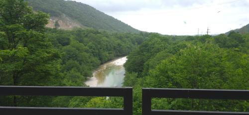a view of a river in a valley at Martvili canyon cottage in Martvili