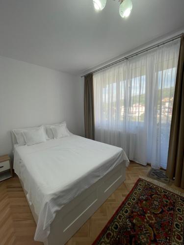 Ένα ή περισσότερα κρεβάτια σε δωμάτιο στο Panoramic Apartment