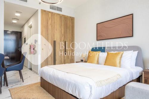 Postel nebo postele na pokoji v ubytování Bloomfileds Executive Studio In Al Maryah Island