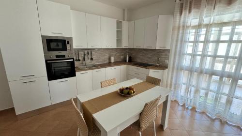 Kuchyň nebo kuchyňský kout v ubytování Terre del Salento Guesthouse