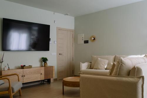 Μια τηλεόραση ή/και κέντρο ψυχαγωγίας στο Joyma Boutique Apartments