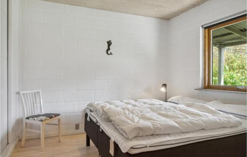Ένα ή περισσότερα κρεβάτια σε δωμάτιο στο Gorgeous Home In Ålbæk With Wifi