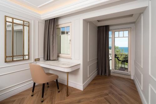 a home office with a desk and a chair at Mula Hotel in Istanbul