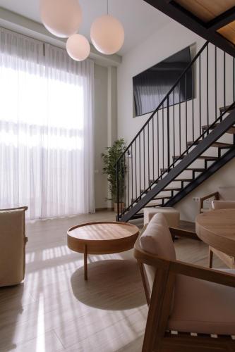 Χώρος καθιστικού στο Joyma Boutique Apartments
