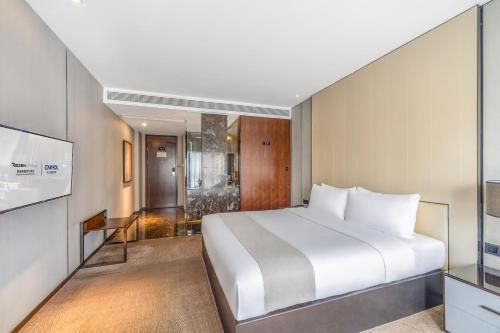 Katil atau katil-katil dalam bilik di Zhonghao International Hotel